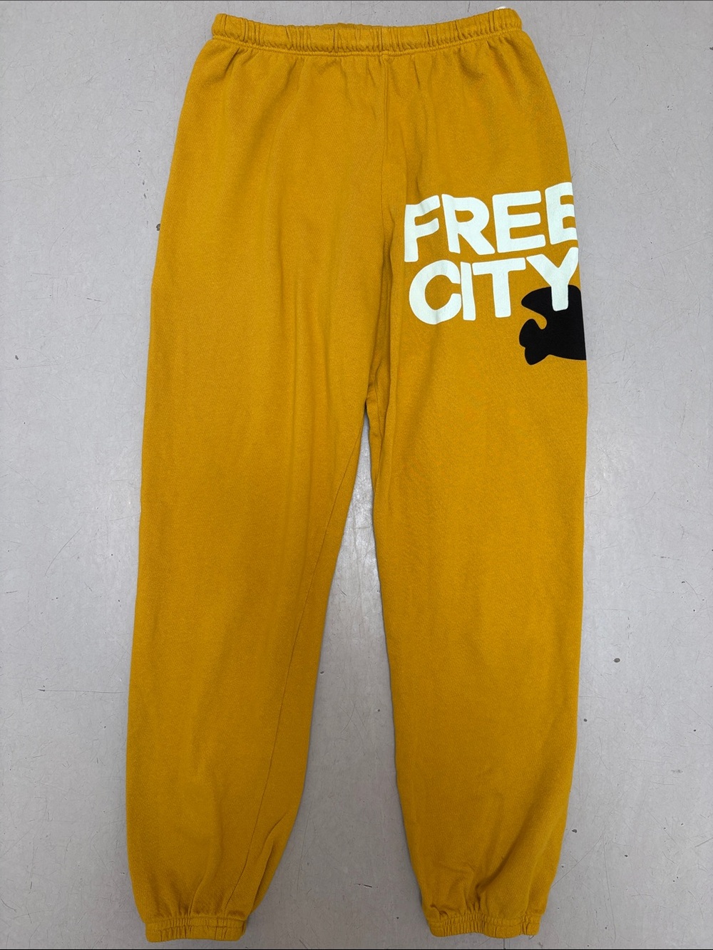 FREECITY Mustard Yellow Large Bird Logo Jogger Sweatpants w Black Graphic Print